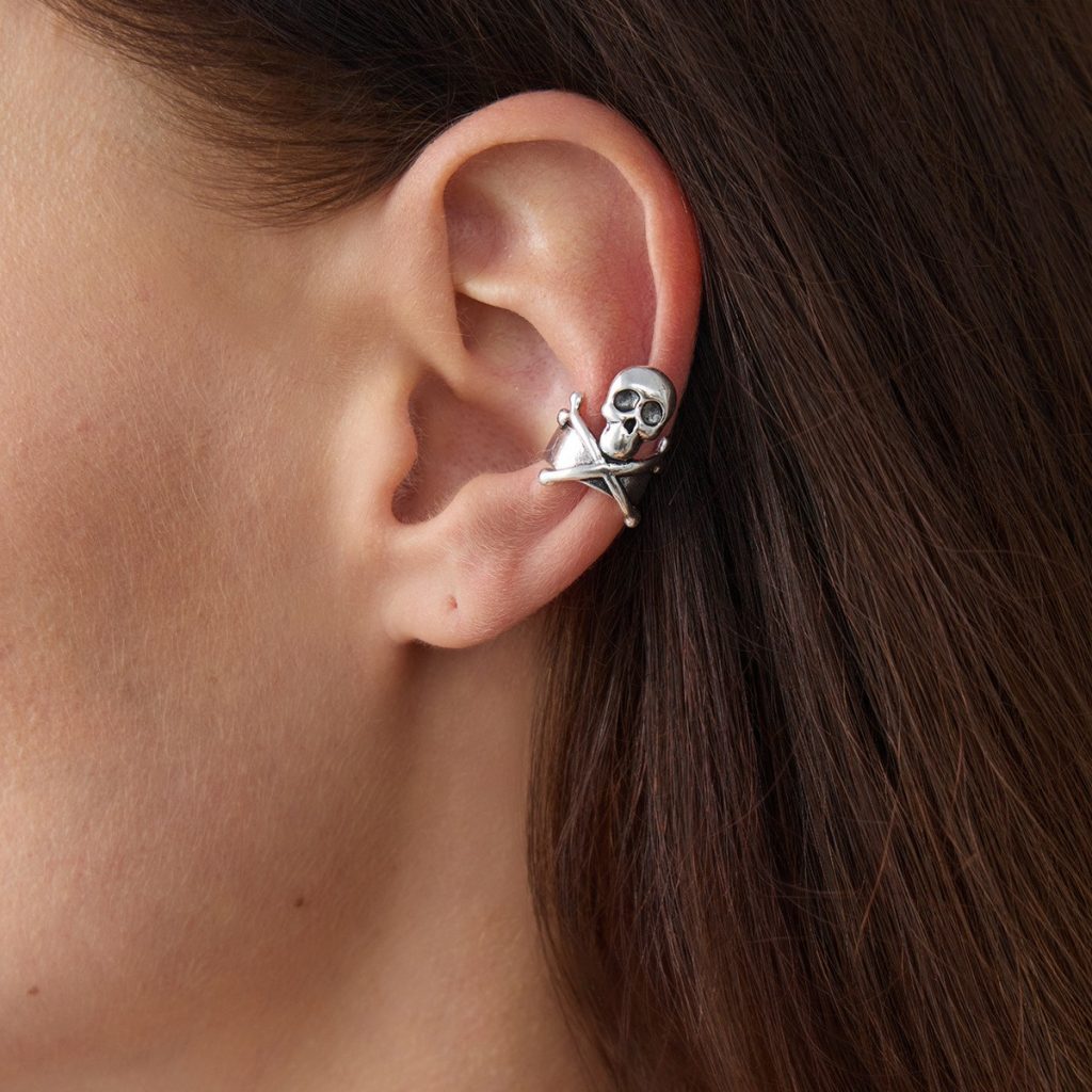 Spooky Motif Ear Cuff — Spider, Skull & Skeleton Designs — Silver-colored skull and crossbones