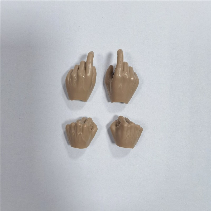 Four bare wheat-tone miniature replacement hands, two pairs for 1:6 figures