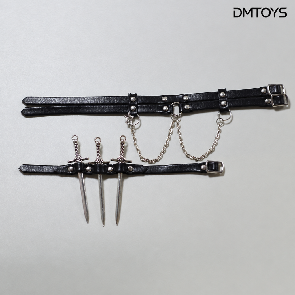 DMTOYS DP008 Classic Black miniature double waist strap with chains and thigh band holding three blade-shaped props