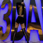 Rear view of full-lace black over-the-knee heeled boots