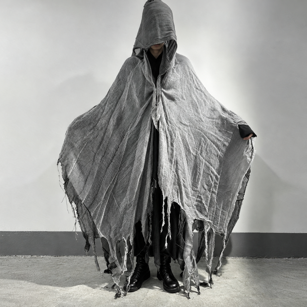 Pale grey hooded cape with dark ragged edges