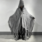 Pale grey hooded cape with dark ragged edges