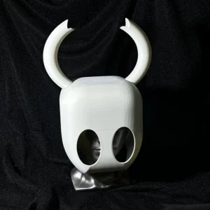 Hollow Knight white mask with curved horns