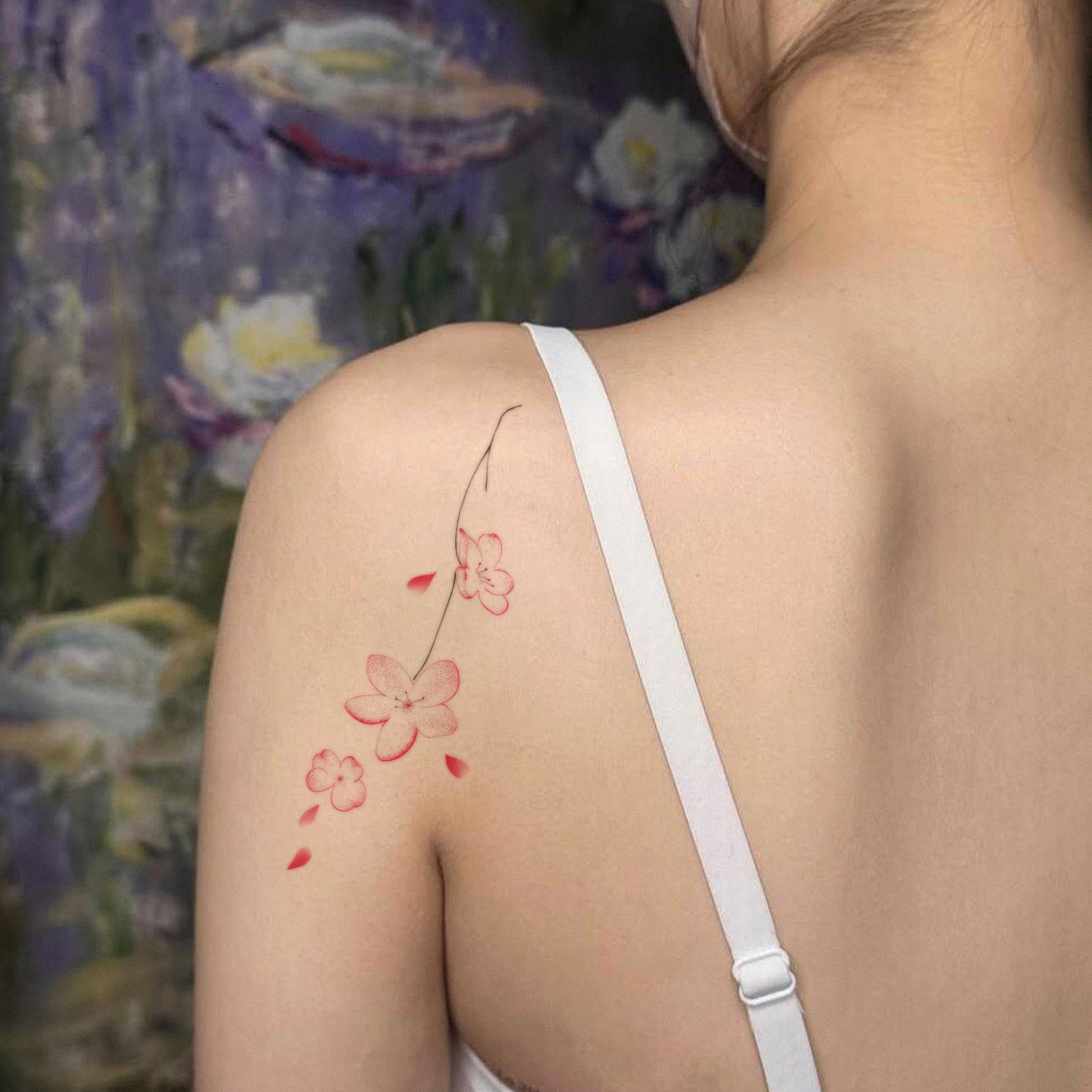 Pink cherry blossom transfer along shoulder