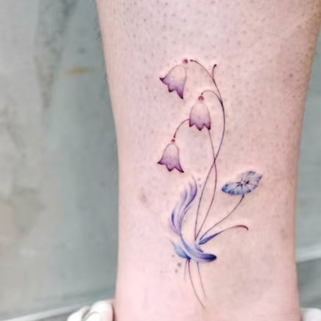 Violet bellflower and blue butterfly transfer on leg