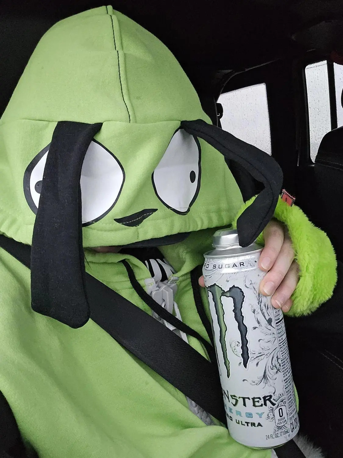 Close-up of the GIR hoodie face, white cartoon eyes and floppy black ears; gloves are styling only