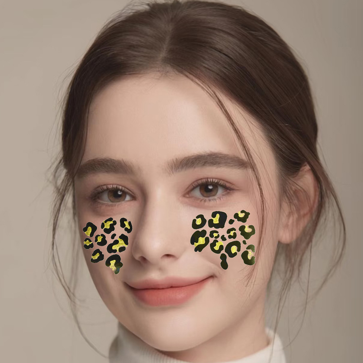 Gold leopard spot face decoration worn on cheeks