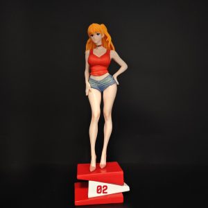 Asuka figurine in red top and blue shorts on red 02 display base, front view