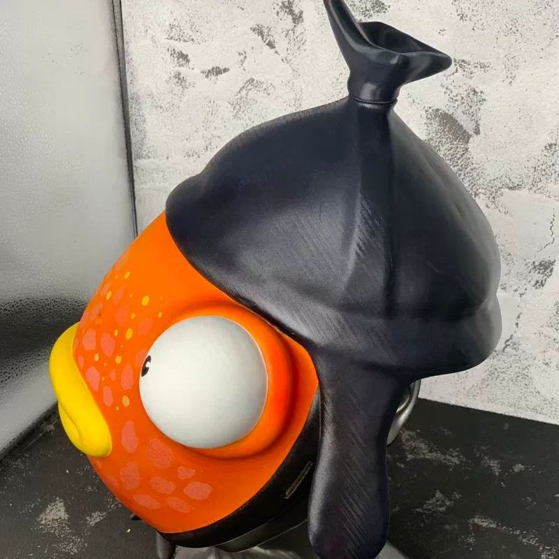 Fishstick mask side profile with projecting eye lips and black cap