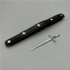 Decorative sword removed from the studded thigh band