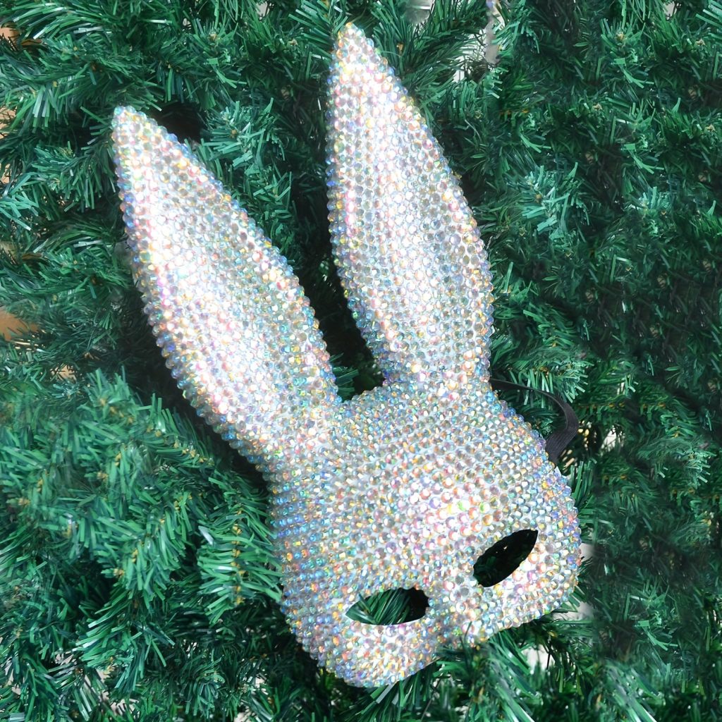 Iridescent bunny-ear mask with sparkling finish