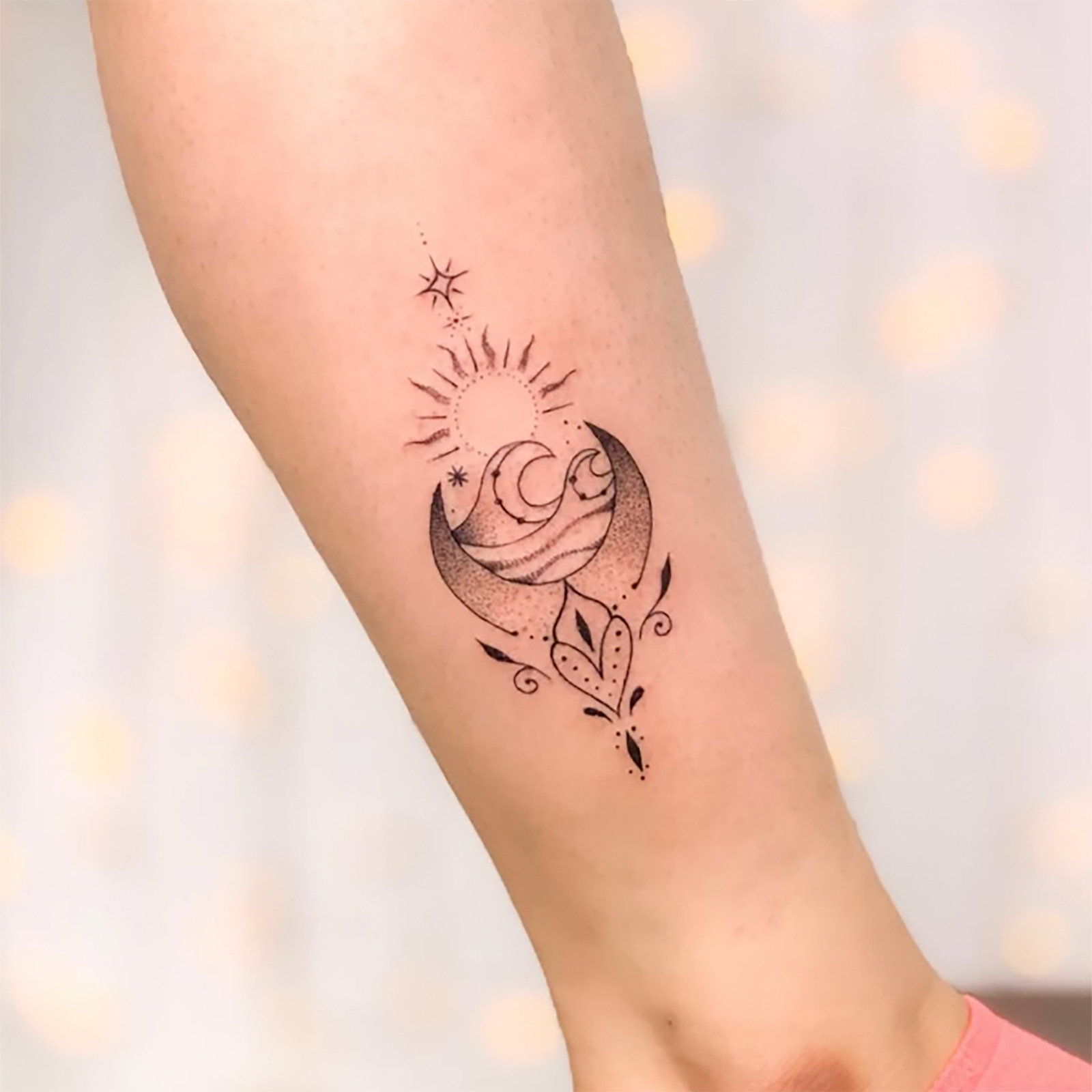 Sun and moon design shown on arm