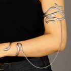 Silver-colored serpent upper-arm and wrist cuffs joined by a draped chain