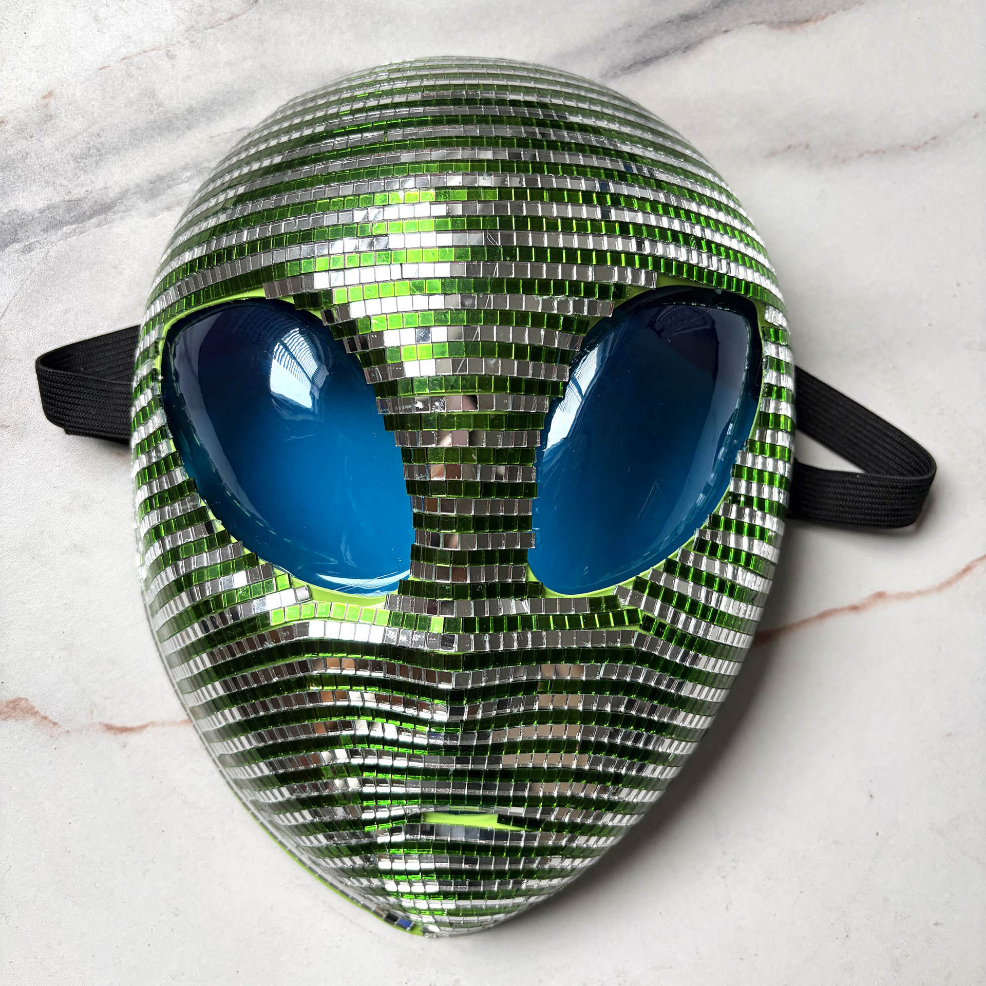 Green &Amp; Silver Disco Alien Mosaic Mask 7 Close-up of the green and silver mosaic mask with blue eye panels and black strap