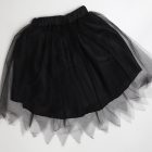 Black costume skirt with gathered waistband and sheer pointed overlay