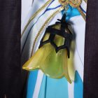 Gold translucent hanging costume ornament close-up