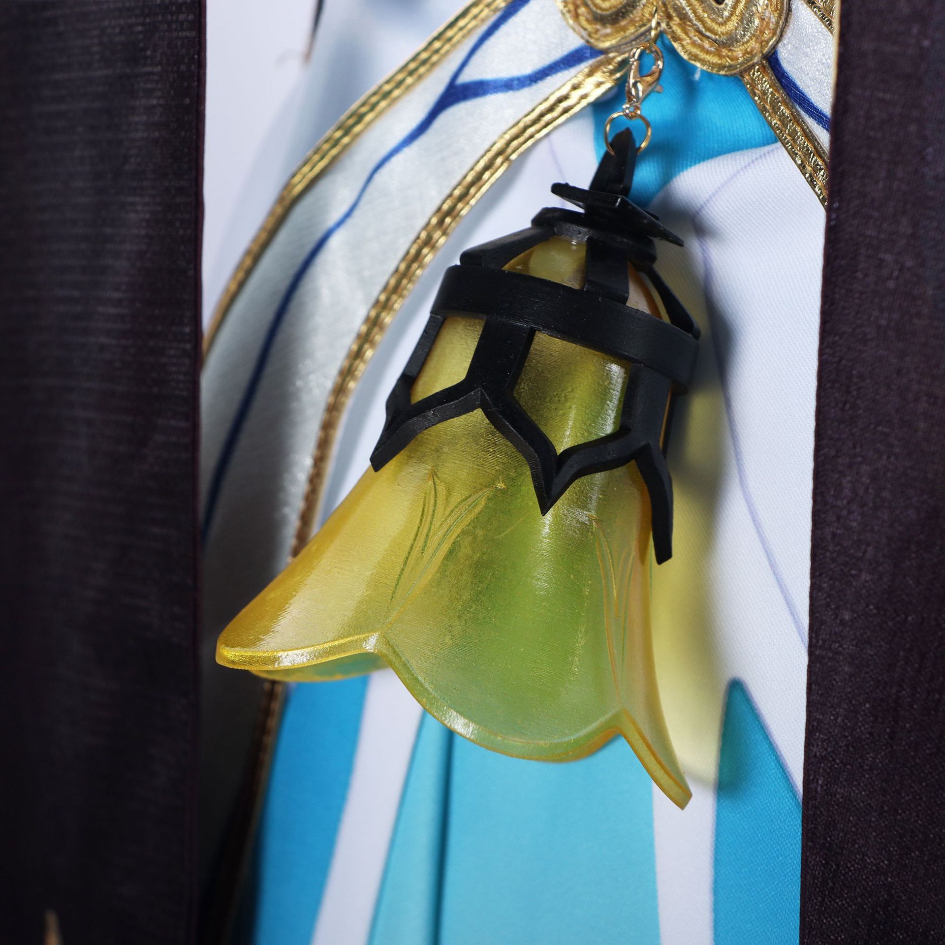 Gold translucent hanging costume ornament close-up