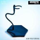 Actual TW1905 stand with flexible support arm bent around dark hexagonal base