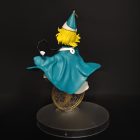 Full back view of Coco figurine with teal cape and gold-patterned display motif