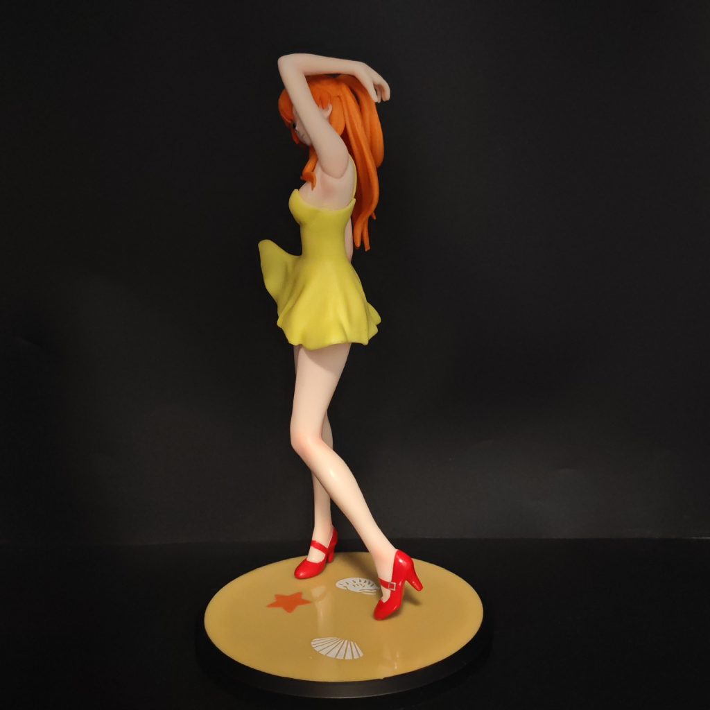 Side view of Asuka figure on round yellow display base
