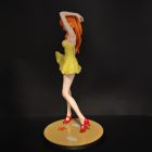 Side view of Asuka figure on round yellow display base