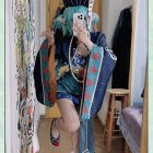 Little Zombie Miku outfit with dark blue sleeves and teal dress