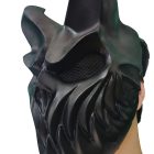 Black horned skull mask worn from the side