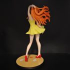 Rear view of Asuka's flowing hair and yellow dress