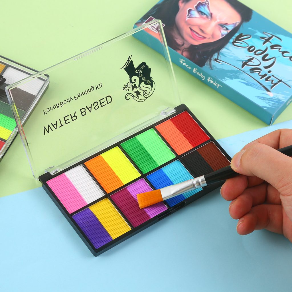 Flat brush loading color from the two-color A eight-pan face paint palette
