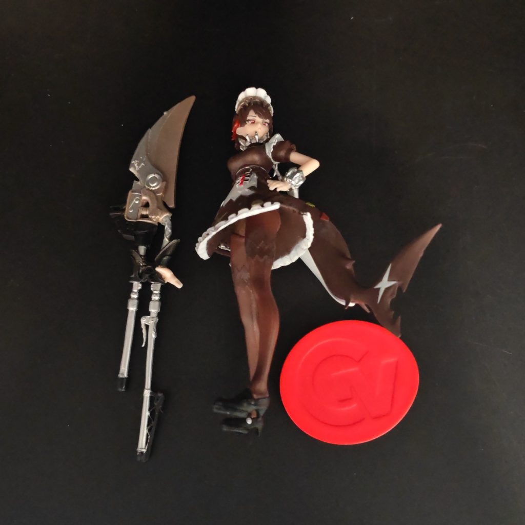 Ellen Joe figure, blade and round red display base shown separately