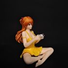 Right three-quarter view of Asuka figure holding the game controller