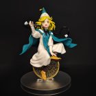Alternate front view of Coco figurine with flowing teal cape and gold-patterned motif