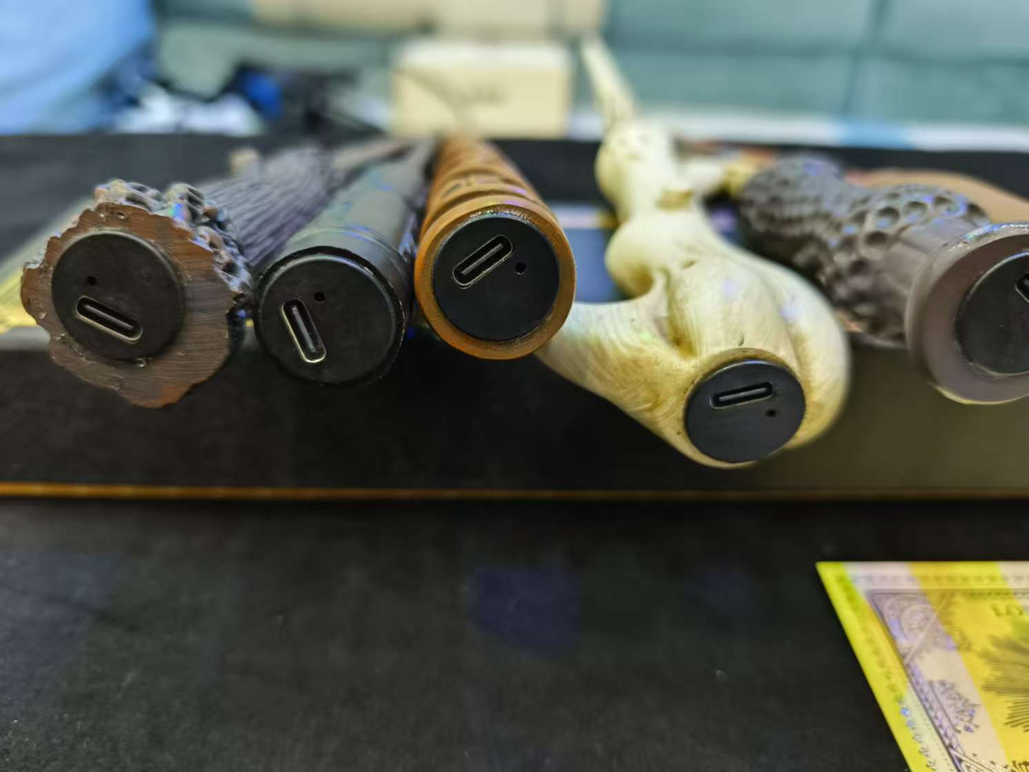 Rechargeable Light-Up Wizard Wand | Seven Character Designs 17 Close view of charging sockets on several wand handles