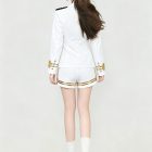 Back of the white stage jacket and gold-trimmed shorts