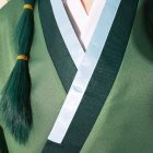 Layered green and pale blue collar detail of Maomao top