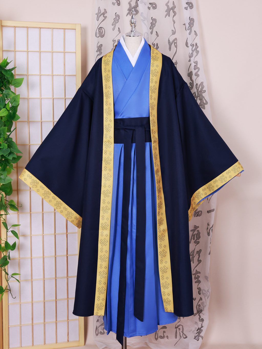 Jinshi navy robe with gold patterned trim and blue inner layers