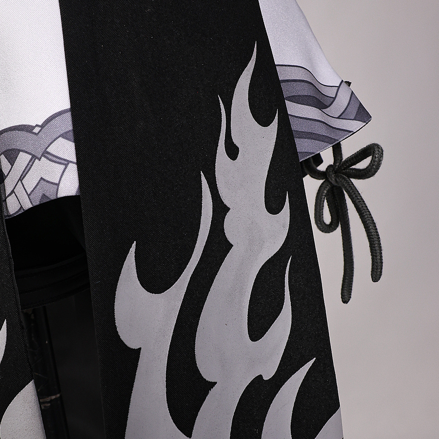 Gray sweeping pattern and tied side panel on female Rover costume