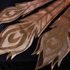 Detail of phoenix costume's layered embroidered rear panels