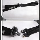 Leon black webbing belt and buckle detail