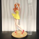 Asuka display figure and round base beside metric ruler for scale
