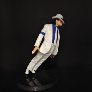 White suit leaning pose figure with white fedora and blue shirt