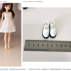 Disclosed AI collector scene beside actual photograph of white miniature bow-strap shoes; display doll and ruler not included