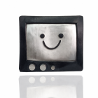 Smiling TV costume mask with black frame, silver-tone smile panel and three decorative knobs