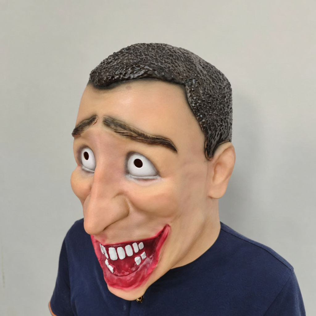 Grinning Face mask worn in three-quarter view showing facial depth and molded hair