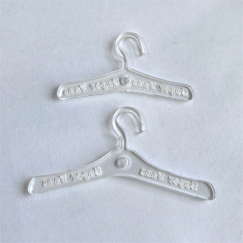 Clear miniature figure clothes hangers in two separately selectable lengths