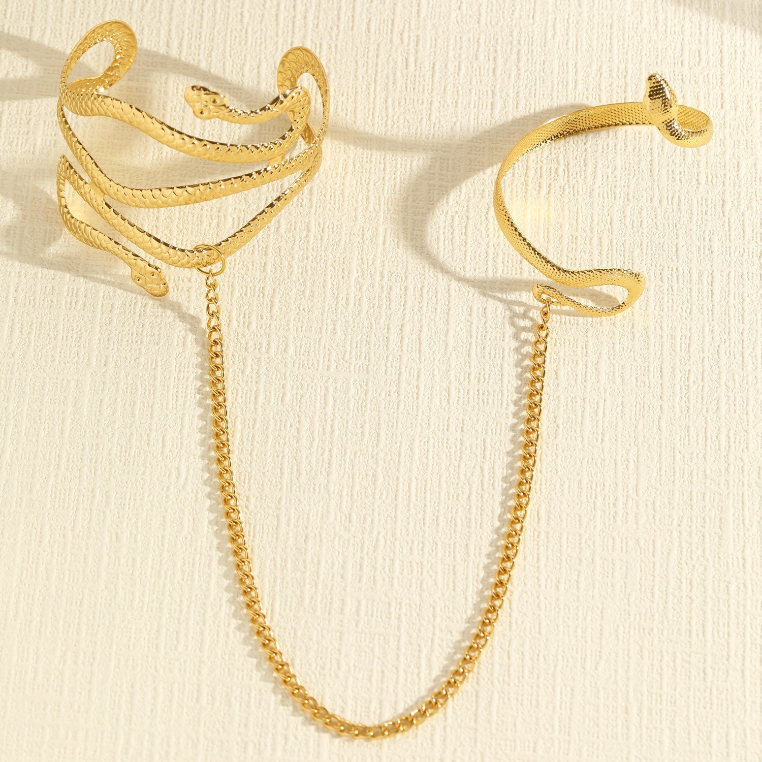 Linked Serpent Upper-Arm and Wrist Cuffs — Gold-colored