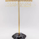 Gold miniature display rack with dark hexagonal base and ten gold hangers