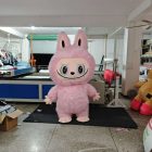 Pink Labubu-style walking mascot