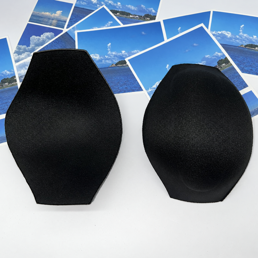 Black medium-profile underwear shaping insert, front and reverse