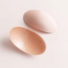 Nude ventilated sponge shoulder pad pair, front and underside